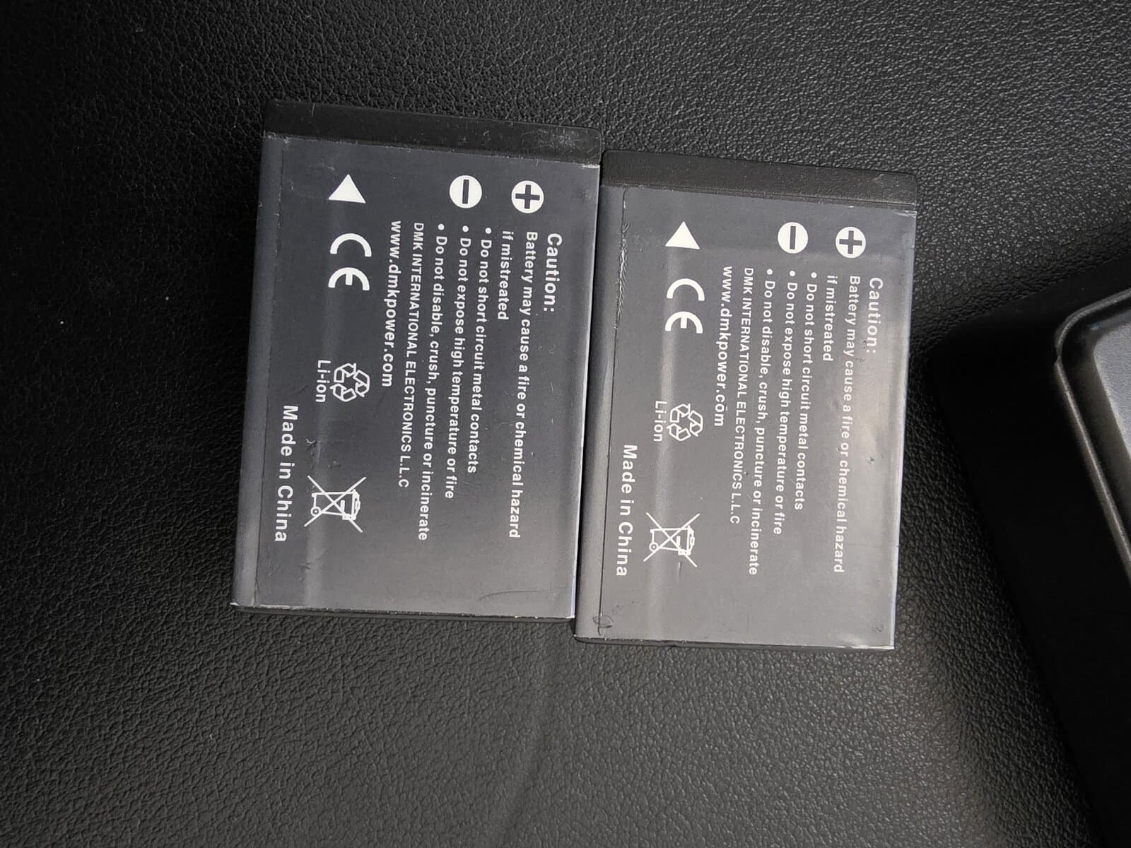 DMK Power LP-E12 batteries (x2) + dual LCD charger — Canon